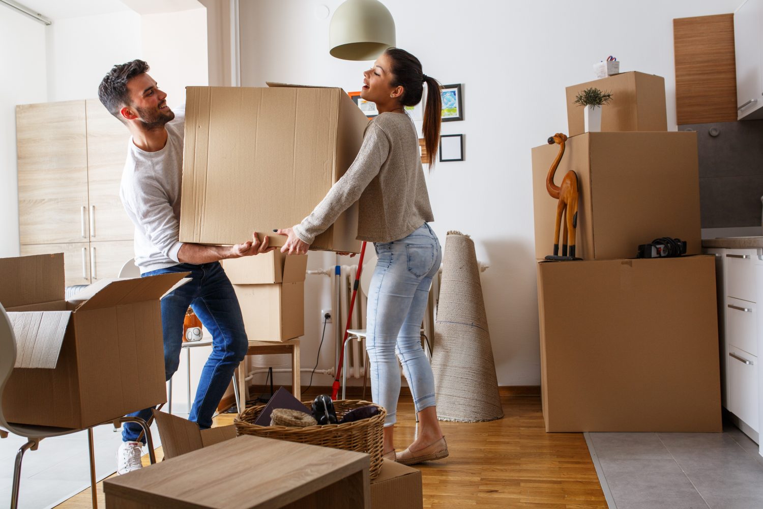 young couple moving into apartment